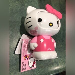 Hello Kitty adorable candy dispenser with candy pieces new‎